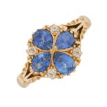 An early 20th century 18ct gold sapphire and diamond cluster ring
