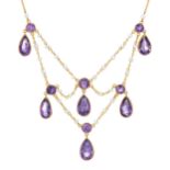 An early 20th century gold, amethyst and seed pearl festoon necklace