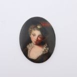 An Italian oval portrait miniature on porcelain, Pellegrina, (Pilgrim woman), titled, indistinctly