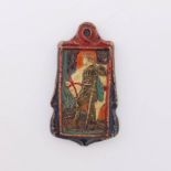A Compton Pottery pendant, of cartouche form, depicting St George in relief, polychrome decorated