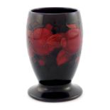William Moorcroft, a flambe pomegranate vase, circa 1920, elongated ovoid form, impressed mark and