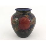William Moorcroft, a pomegranate vase, ovoid form with curved opening, impressed marks and