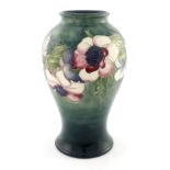 William Moorcroft, an Anemone vase, circa 1930, baluster form, green ground, impressed marks and