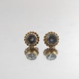 A pair of 9ct gold aquamarine single-stone stud earrings