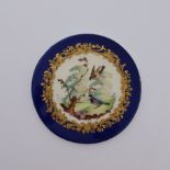 A Derby porcelain plaque, mid 19th Century, painted with two birds beside a tree stump, raised
