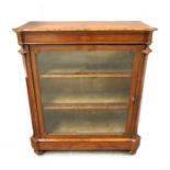 A mid Victorian figured walnut pier cabinet, circa 1860, crossbanded and strung throughout, single