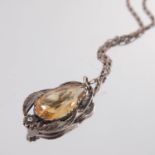 An Art Nouveau silver, citrine foliate pendant, wi