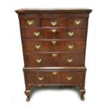 A George II figured walnut chest on stand, circa 1750, moulded cornice long drawer over three
