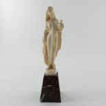 A late 19th Century European ivory figure of a cla