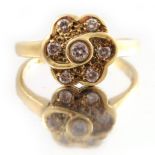 An 18ct gold diamond floral cluster ring