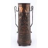 An Arts & Crafts copper twin handled vase, circa 1905, of tapered cylinder form with stylized