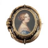 A 19th century yellow metal, portrait miniature swivel pendant / brooch