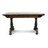 A Regency rosewood library table, circa 1820, double frieze drawers with moulded bead edging,
