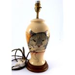 A Moorcroft Companions Cat, inverse elongated baluster form, on wooden base, overall 37cm high