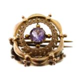 An early 20th century amethyst foliate brooch