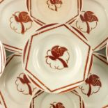 An Art Deco part dinner service of Badonvillier Paradis plates and bowl