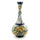 William Moorcroft for James Macintyre, a Florian Ware cornflower vase, circa 1905, bottle form