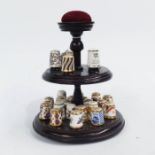 C Parker for Royal Worcester, handpainted thimble, a similar example, and a quantity of Royal