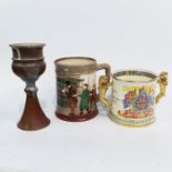 Royal Doulton tankard, circa 1949, 'Oliver Twist, together with a Paragon Coronation mug King Edward