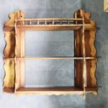 A three tier wall shelf with bobbin turned gallery.