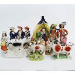 A selection of 19th Century Staffordshire figures, to include Auld Lang Syne, a gallant and