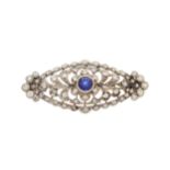 An Edwardian sapphire and diamond openwork brooch