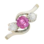 A mid 20th century 18ct gold and platinum, pink sapphire and diamond three-stone ring