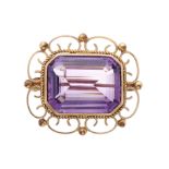 A mid 20th century 9ct gold amethyst openwork brooch