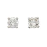 A pair of brilliant-cut diamond stud earrings