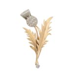 An early 20th century Scottish 9ct gold and platinum, diamond thistle brooch