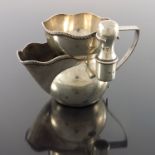 A Victorian silver shaving mug with brush handle