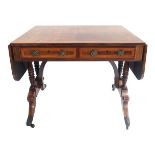 A Regency rosewood sofa table, circa 1820, satinwood crossbanded and ebony strung throughout, twin