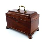 A George III mahogany tea caddy, circa 1790, barbers pole strung throughout with brass swing
