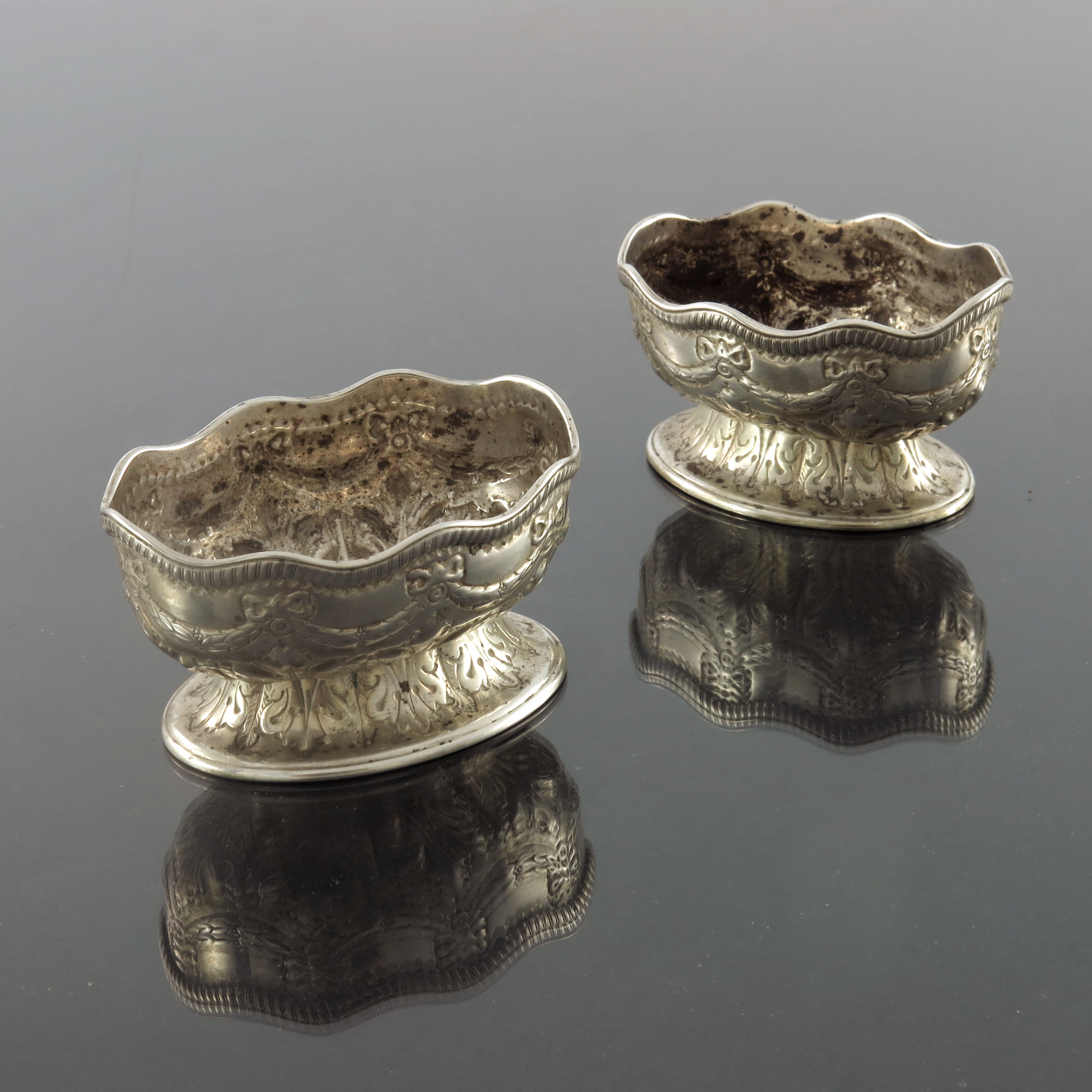 A pair of Victorian silver salt cellars, Holland, Son and Slater, London 1882