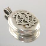 A late 19th century silver locket pendant