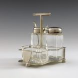 Christopher Dresser for Hukin and Heath, a silver plated and cut glass cruet stand