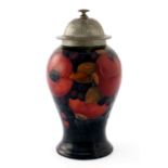 William Moorcroft for Liberty and Co., a Tudric Pewter mounted Pomegranate vase and cover