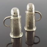 Roger John Squires, a pair of Modernist silver salt and pepper pots, London 2002