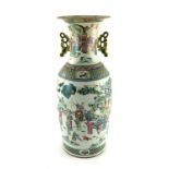 A large 19th Century Chinese baluster vase, reticulated twin handles, painted in polychrome in the