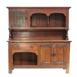 Leonard Wyburd for Liberty & Co, a Lochleven Arts & Crafts oak sideboard, circa 1900, moulded