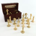 A 19th Century Calvert ivory chess set, in natural and faded grey opposing colouring, the pure white