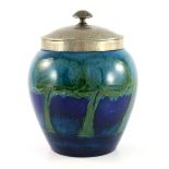 William Moorcroft for Liberty and Co., a Moonlit Blue, Tudric pewter mounted ginger jar and cover