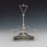 Chrsitopher Dresser (attributed) for James Dixon and Sons, a silver plated three decanted cruet stan