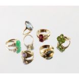 A selection of six 9ct gold gem-set rings