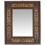 A 19th century hardwood hall mirror, rectangular form with beasts and tendril panels
