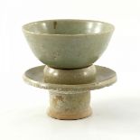 A Song Dynasty Jun tea bowl on stand, in two sections with celadon glaze, height 14cm