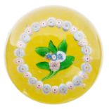 St Louis, a large floral and millefiori wreath glass paperweight
