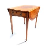 A George III satinwood Pembroke table of Sheraton design, circa 1800, crossbanded and strung top,