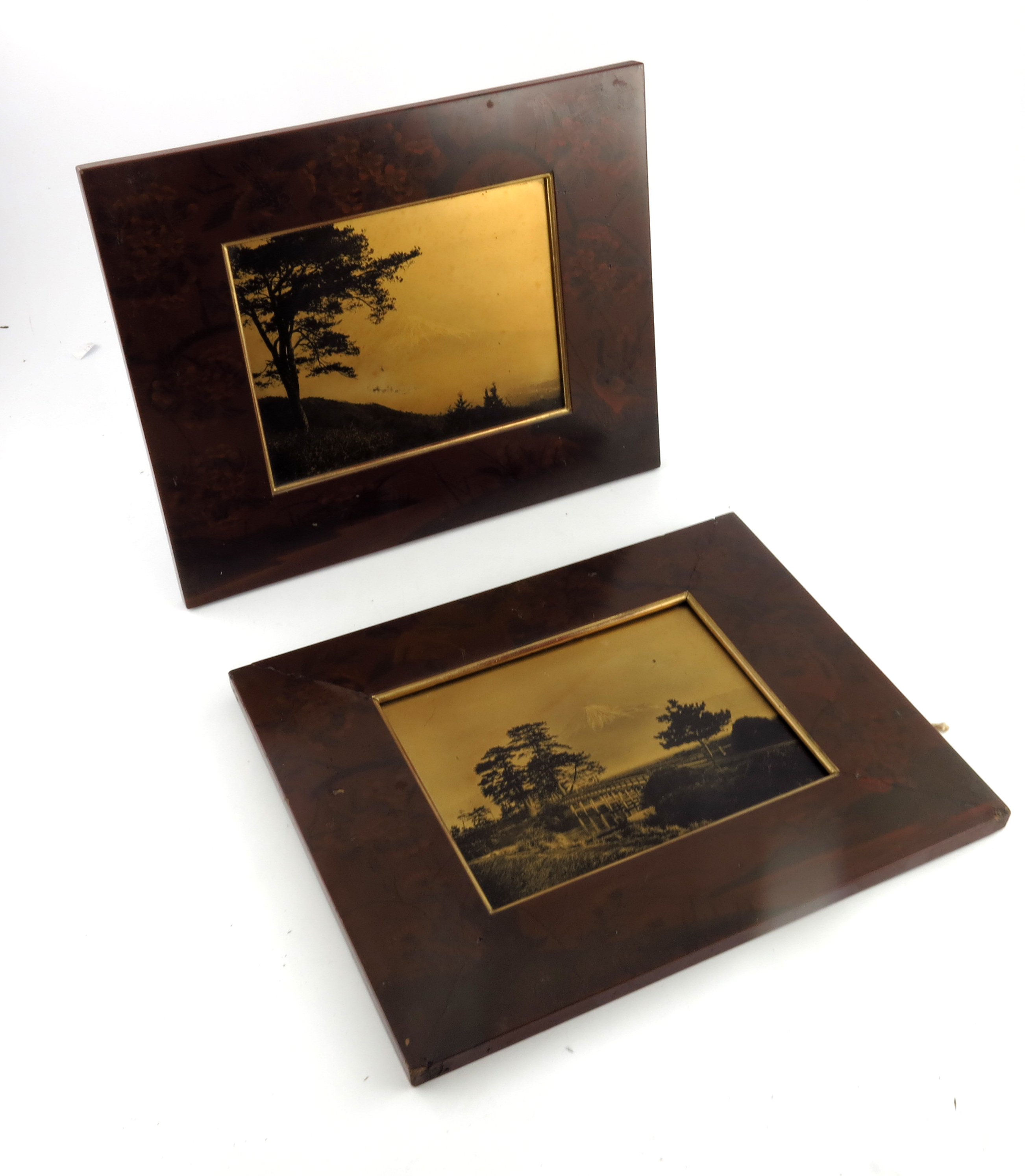 A pair of Japanese gilt and monochrome photographic views of Mount Fuji, Meiji period, 1868-1912,