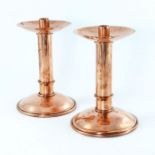 A pair of large Jugendstil copper candlesticks, circa 1925, cylindrical column form on domed bases w